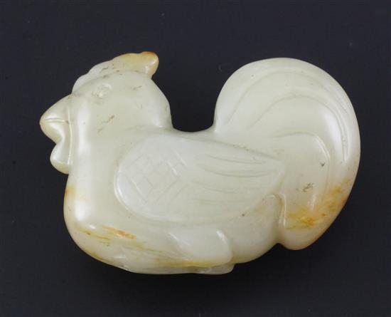 A Chinese pale Celadon and russet jade cockerel figure, 4.3cm